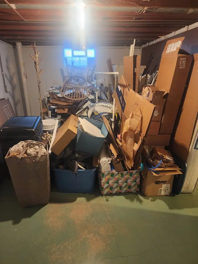 Roll-off dumpster container at job site for 20 Yard Dumpster Rental in Clinton